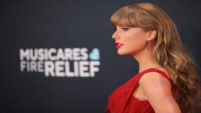 FILE PHOTO: Taylor Swift poses at the red carpet during the 67th Annual Grammy Awards in Los Angeles, California, U.S., February 2, 2025. REUTERS/Daniel Cole/File Photo