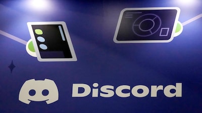 FILE - A Discord display stands at the company's booth at the Game Developers Conference 2023, in San Francisco, March 22, 2023. (AP Photo/Jeff Chiu, File)