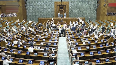 **EDS: THIRD PARTY IMAGE; SCREENGRAB VIA SANSAD TV** New Delhi: Opposition members protest in the well as Lok Sabha Speaker Om Birla conducts proceedings in the House during the Budget session of Parliament, in New Delhi, Friday, Feb. 6, 2026. (Sansad TV via PTI Photo) (PTI02_06_2026_000087B)