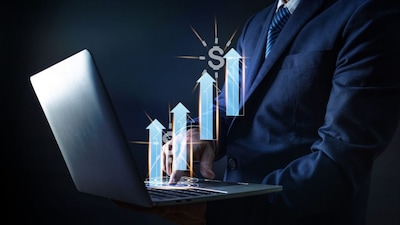 The JM Financial Hurun India Unlisted Gems 2026 lists high-potential Indian companies that show the scale and performance linked to IPO readiness. Retail and consumer firms make up half of the top 10, with others from financial services, real estate, manufacturing and semiconductors. None has announced IPO plans so far. Here’s a look at the top 10 unlisted companies by revenue. (Image: Canva)