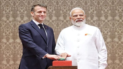 India's Prime Minister Narendra Modi and France's President Emmanuel Macron press a button to virtually inaugurate first H125 helicopter final assembly line during an event in Mumbai, India, February 17, 2026. India's Press Information Bureau/Handout via REUTERS THIS IMAGE HAS BEEN SUPPLIED BY A THIRD PARTY. NO RESALES. NO ARCHIVES.