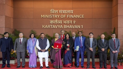 New Delhi: Finance Minister Nirmala Sitharaman with officials pose outside the Ministry of Finance before the presentation of the Union Budget 2026-27, in New Delhi, Sunday, Feb. 1, 2026. Minister of State for Finance Pankaj Chaudhary and others also seen. (PTI Photo/Salman Ali)(PTI02_01_2026_000027B)