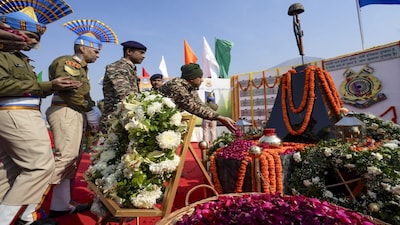 Pulwama: Security personnel pay tribute to CRPF jawans who lost their lives in the 2019 Pulwama terror attack on its anniversary, at Lethpora in Pulwama district, Jammu and Kashmir, Saturday, Feb. 14, 2026. (PTI Photo/S Irfan)(PTI02_14_2026_000178B)