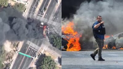 Drone footage from Guadalajara captured vehicles set ablaze, with thick plumes of smoke rising over Mexico’s second-largest city. (X via News18) 