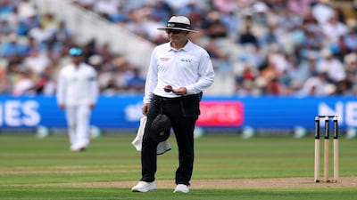 Cricket - Second Test - England v India - Edgbaston Cricket Ground, Birmingham, Britain - July 2, 2025 Umpire Chris Gaffaney holds the ball before it was changed Action Images via Reuters/Paul Childs