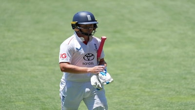 Cricket - The Ashes - Australia v England - Third Test - Adelaide Oval, Adelaide, Australia - December 20, 2025 England's Ollie Pope walks after losing his wicket REUTERS/Asanka Brendon Ratnayake