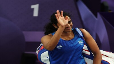 FILE PHOTO: Paris 2024 Olympics - Badminton - Women's Singles Group play stage - Porte de La Chapelle Arena, Paris, France - July 31, 2024. V. Sindhu Pusarla of India thanks the crowd after winning the Group M match against Kristin Kuuba of Estonia. REUTERS/Hamad I Mohammed/ File Photo