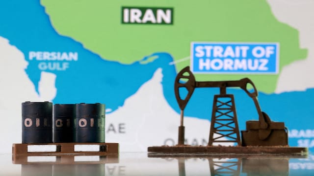3D-printed oil barrels, an oil pump jack and a map showing the Strait of Hormuz and Iran appear in this illustration taken March 2, 2026. REUTERS/Dado Ruvic/Illustration