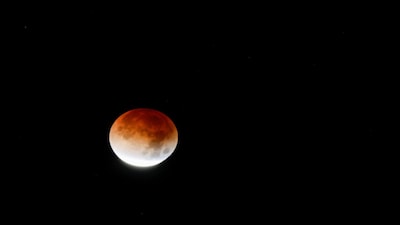 The moon during a total lunar eclipse in Panchimalco, El Salvador, March 3, 2026. REUTERS/Jose Cabezas