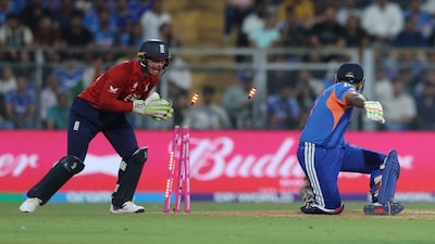 Cricket - ICC Men's T20 World Cup 2026 - Semi Final - India v England - Wankhede Stadium, Mumbai, India - March 5, 2026 India's Suryakumar Yadav is stumped out by England's Jos Buttler REUTERS/Francis Mascarenhas