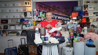 Lash Fary, founder of Distinctive Assets, shows items included in the "Everyone Wins" nominee gift bag in Los Angeles, California, U.S., March 9, 2026. REUTERS/Arafat Barbakh