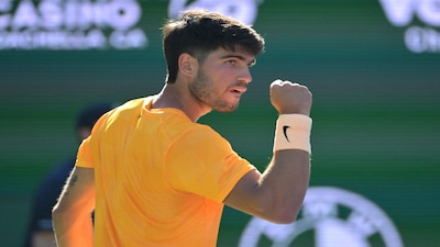 Mar 11, 2026; Indian Wells, CA, USA;  Carlos Alcaraz (ESP) reacts after a point as he defeated Casper Ruud (NOR) during the fourth round in the BNP Paribas Open at the Indian Wells Tennis Garden. Mandatory Credit: Jayne Kamin-Oncea-Imagn Images