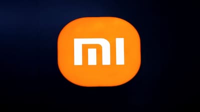 A Xiaomi logo is pictured at the Xiaomi booth during a media day for the Auto Shanghai show in Shanghai, China April 24, 2025. REUTERS/Go Nakamura