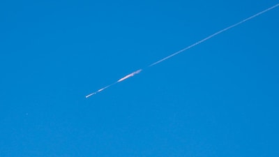 A projectile launched from Iran heads towards Israel, amid the U.S.-Israeli conflict with Iran, as seen from Ramallah, in the Israeli-occupied West Bank, March 25, 2026. REUTERS/ Mohammed Torokman     TPX IMAGES OF THE DAY