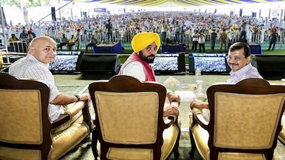 **EDS: THIRD PARTY IMAGE** In this image posted on March 28, 2026, Punjab Chief Minister Bhagwant Mann, AAP chief Arvind Kejriwal and party leader Manish Sisodia during a public meeting, in Fatehgarh Sahib district. (@AAPPunjab/X via PTI Photo) (PTI03_28_2026_000419B)