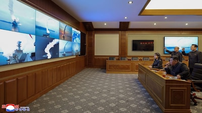 This photo provided by the North Korean government shows its leader Kim Jong Un, front right, and his daughter, second right at front, watch what it says the cruise missiles launches from the naval destroyer, the Choe Hyon, via video, in North Korea, Tuesday, March 10, 2026. Independent journalists were not given access to cover the event depicted in this image distributed by the North Korean government. The content of this image is as provided and cannot be independently verified. Korean language watermark on image as provided by source reads: "KCNA" which is the abbreviation for Korean Central News Agency. (Korean Central News Agency/Korea News Service via AP)