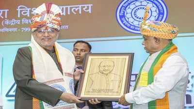 Agartala: Vice President C. P. Radhakrishnan, left, being presented a memento at Tripura University's 14th Convocation ceremony, in Agartala, Sunday, March 8, 2026. (PTI Photo) (PTI03_08_2026_000231B)