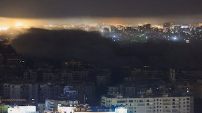 Smoke rises from Beirut's southern suburbs following an Israeli strike, after an escalation between Hezbollah and Israel, amid the U.S.-Israeli conflict with Iran, Lebanon, March 24, 2026. REUTERS/Mohamed Azakir