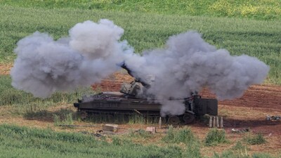 An Israeli artillery unit fires towards Lebanon, amid escalating hostilities between Israel and Hezbollah, as the U.S.-Israeli conflict with Iran continues, in northern Israel, March 26, 2026. REUTERS/Tyrone Siu