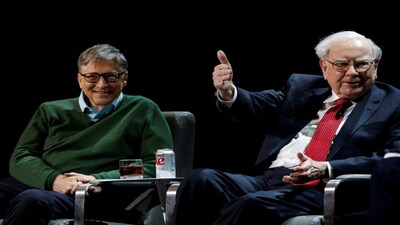 FILE PHOTO: Warren Buffett, chairman and CEO of Berkshire Hathaway, speaks while Bill Gates looks on at Columbia University in New York, U.S., January 27, 2017. REUTERS/Shannon Stapleton/File Photo