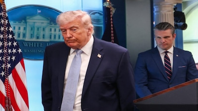 U.S. President Donald Trump and Secretary of Defense Pete Hegseth leave following a press conference in the James S. Brady Press Briefing Room at the White House in Washington, D.C., U.S., April 6, 2026. REUTERS/Kevin Lamarque
