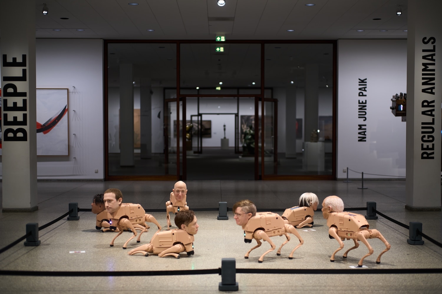 Robot dogs with Musk, Zuckerberg heads ‘poo’ AI art in Berlin museum show | In pics