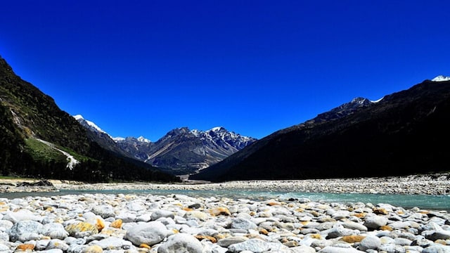 Yumthang Valley SikkimValley of Flowers Sikkim Lachung Sikkim landscape Himalayan valley Yumthang grazing pastures Sikkim yaks in Yumthang Valley hot springs Yumthang Naga Falls Sikkim