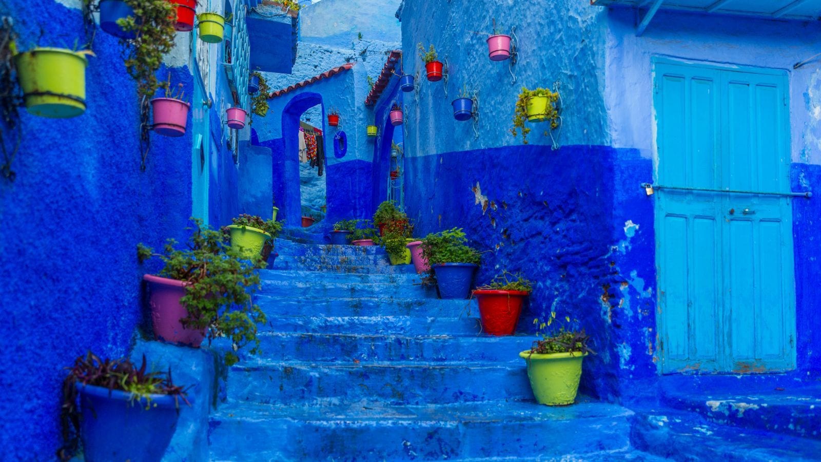 From Morocco's blue alleys to Italy's rainbow homes: 10 colourful streets to visit