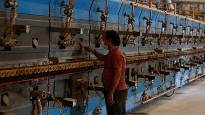 An employee checks movement of tiles inside a ceramic tiles kiln at a factory in Morbi, Gujarat, India, March 5, 2026. REUTERS/Amit Dave