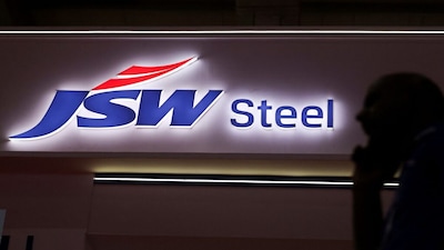 A man walks past the JSW Steel stall at the India Steel 2025 Conference in Mumbai, India, April 25, 2025. REUTERS/Francis Mascarenhas