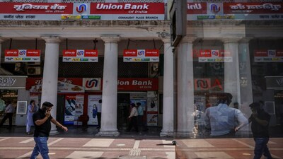 A man walks past a branch of Union Bank of India in New Delhi, India, April 5, 2023. REUTERS/Adnan Abidi
