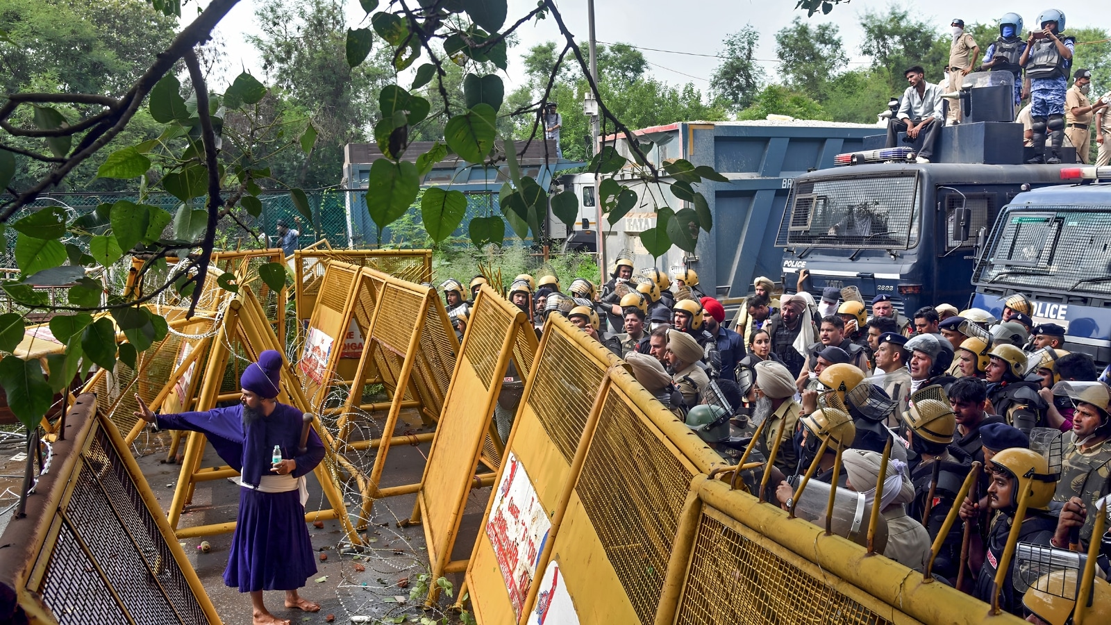 Tear gas, water cannons greet Sikh march to Punjab Governor's house | In pics