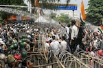 Police use water cannons, tear gas, batons as exam protesters try to reach Jharkhand assembly Police use water cannons, tear gas, batons as exam protesters try to reach Jharkhand assembly