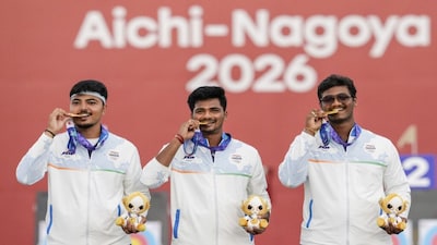 Nagoya: Gold medallist, from left, India's Kushal Dalal, Sahil Jadhav and Ganesh Mani Ratnam Thirumuru pose for photographers during the medal ceremony for the compound men's team archery event at the 20th Asian Games, in Nagoya, Japan, Wednesday, Sept. 30, 2026. (PTI Photo/Arun Sharma) (PTI09_30_2026_000151B)