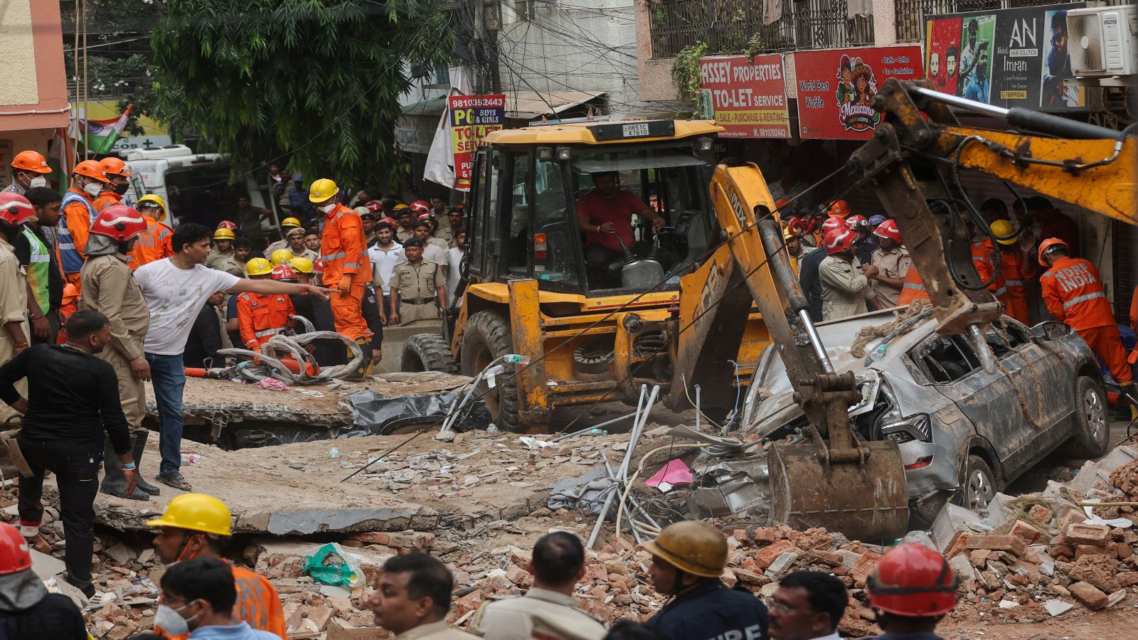 Delhi building collapse: Photos show Satya Niketan PG reduced to rubble as rescue continues