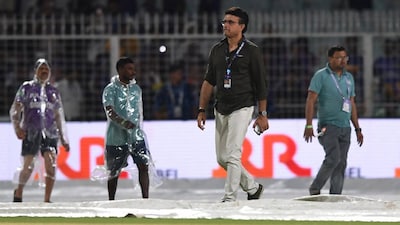 Cricket - Indian Premier League - IPL - Kolkata Knight Riders v Punjab Kings - Eden Gardens, Kolkata, India - April 6, 2026 President of the Cricket Association of Bengal Sourav Ganguly walks on the pitch as the covers are removed during the rain delay, before the match is abandoned REUTERS/Abhijit Addya