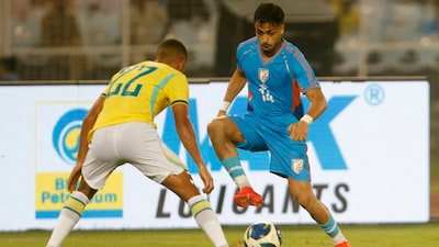 Soccer Football - International Friendly - India v Brazil - Salt Lake Stadium, Kolkata, India - October 3, 2026 India's Vikram Partap Singh in action with Brazil's Samuel Lino REUTERS/Sahiba Chawdhary