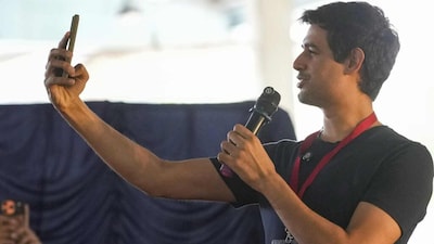 YouTuber Dhruv Rathee during the 'people's tribunal� protest, organised by various civil society groups against the Special Intensive Revision (SIR) of electoral rolls, at Freedom Park in Bengaluru, Thursday, Oct. 8, 2026. (PTI Photo/Shailendra Bhojak)