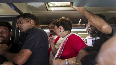 New Delhi: Congress MP Priyanka Gandhi Vadra inside a police vehicle after being detained during an INDIA bloc protest march towards the Election Commission of India (ECI) office, in New Delhi, Tuesday, Oct. 6, 2026. (PTI Photo/Karma Bhutia)(PTI10_06_2026_000102B)