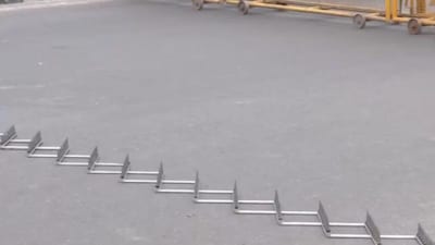 The Delhi police have installed spike strips in the industrial hub area of Mohan Estate in southeast Delhi to prevent any vehicle from moving from the prohibited area. (Image X@ANI)