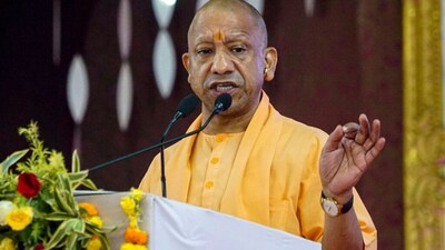 CM Adityanath honours sanitation workers in Varanasi