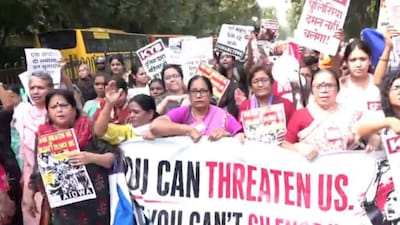Women stage protest against the Delhi Polic, demanding action against police personnel accused of sexually assaulting and harassing women and transgender protesters. (Image X@PTInews)