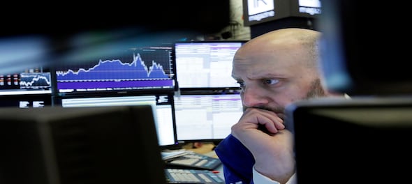 World stocks edge lower as trade worries overshadow rising oil prices