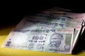 Rupee opens 14 paise lower at 69.76 a dollar, bond yields fall