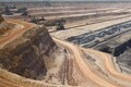 Rio Tinto falls as profit miss highlights cost concerns