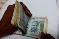 Rupee at fresh record low, market puzzled at little supply from RBI