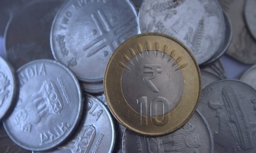 Rupee pares some losses, down 11 paise against dollar
