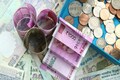 Rupee loses 10 paise to 69.52 a dollar in opening trade, bond yields fall