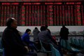 Asia shares flat after mixed China data, pound near 9-month peak