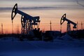 Oil nudges higher on Venezuela and Iran sanctions, OPEC cuts
